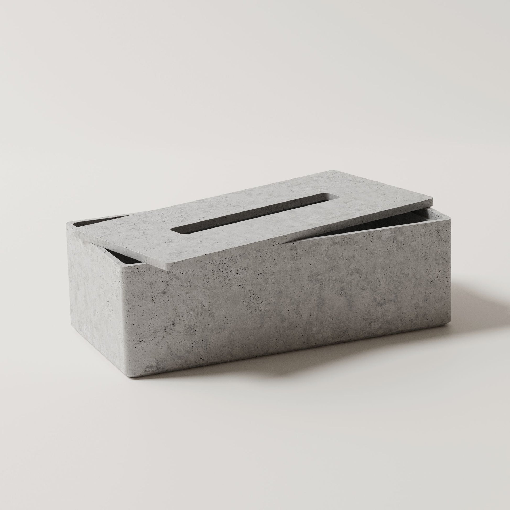Originálny box na vreckovky Mooneton vyrobený z vysokopevnostného betónu s otváracím vekom. Farba - Šedá